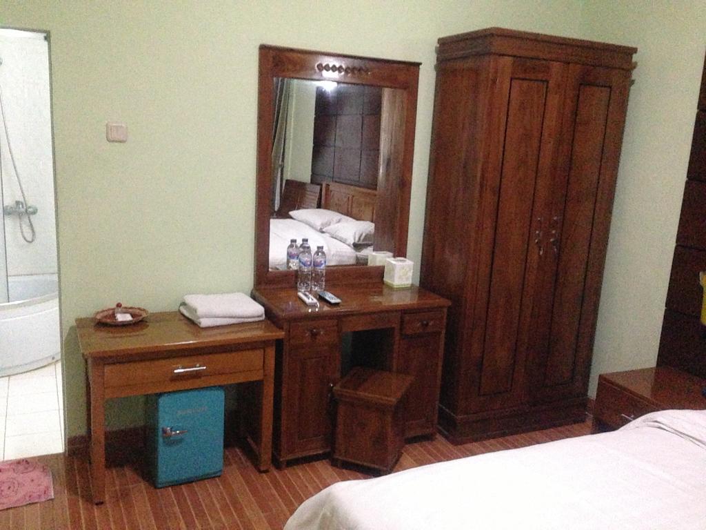 Global Inn Keluarga Sedati Pokoj fotografie