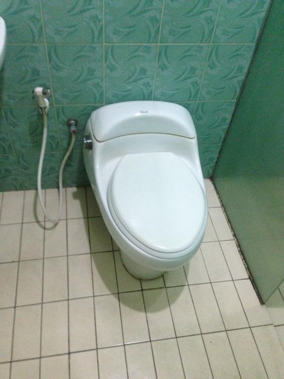 Global Inn Keluarga Sedati Pokoj fotografie